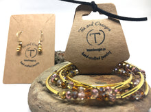 Load image into Gallery viewer, Bracelet - stretch wrap, topaz Czech rondelles, brass and gold noodles