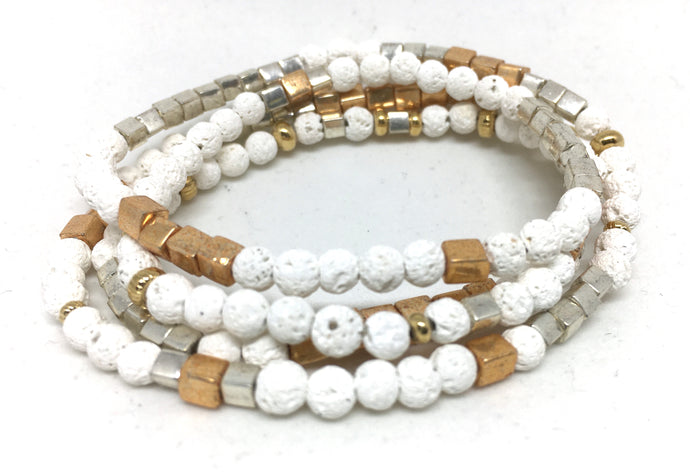 Bracelet - stretch wrap, white lava, Miyuki cubes and gold donuts